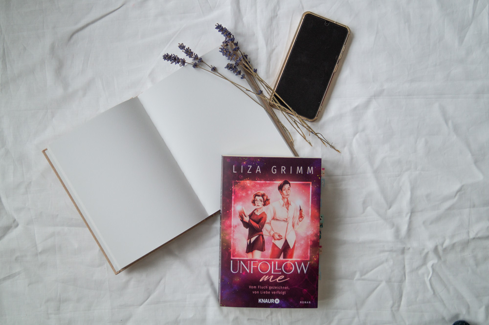 Liza Grimms Buch "Unfollow Me" bietet eine wundervolle Lovestory in einem Urban Fantasy Setting Liza Grimms Buch "Unfollow Me" ist zu sehen.